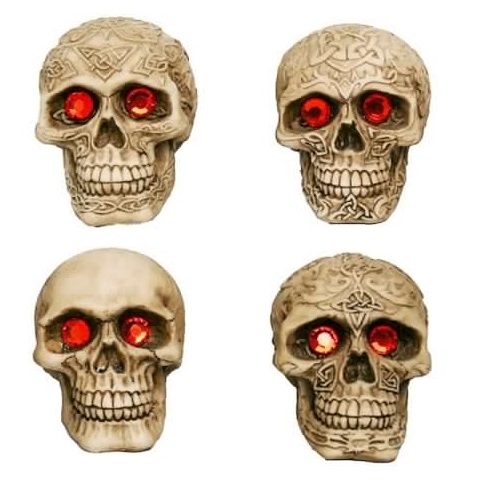 Teschio con occhi rossi - soprammobile da collezione a forma di cranio umano decorato con rune ed occhi con gemme rosse.
